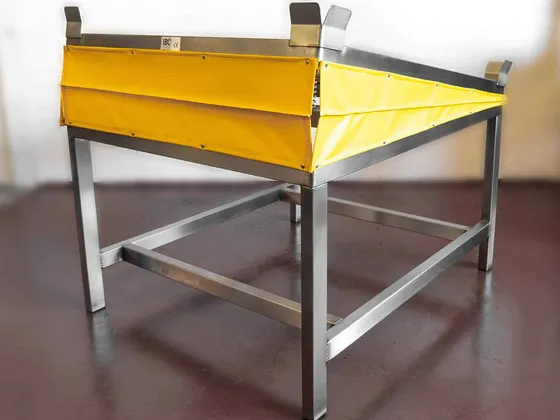 Yellow Cover on an IBC Tippers product to prevent spilling of liquids